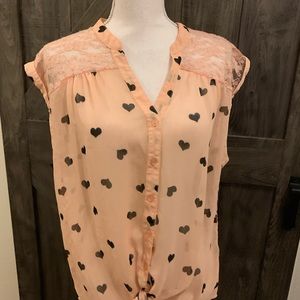 Sheer sleeveless blouse from front tie